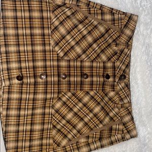 A brown, tan plaid skirt. Brand new, worn once.